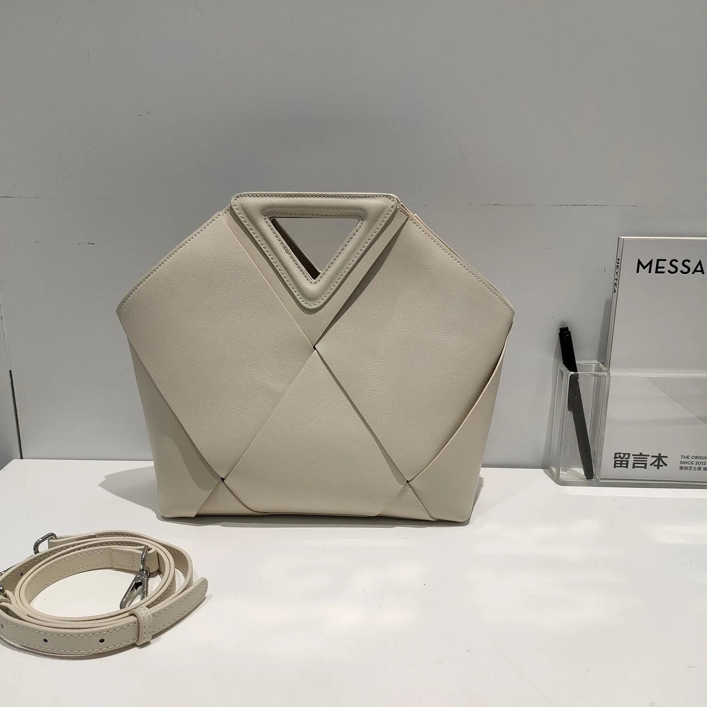 Leather weaving shoulder bag